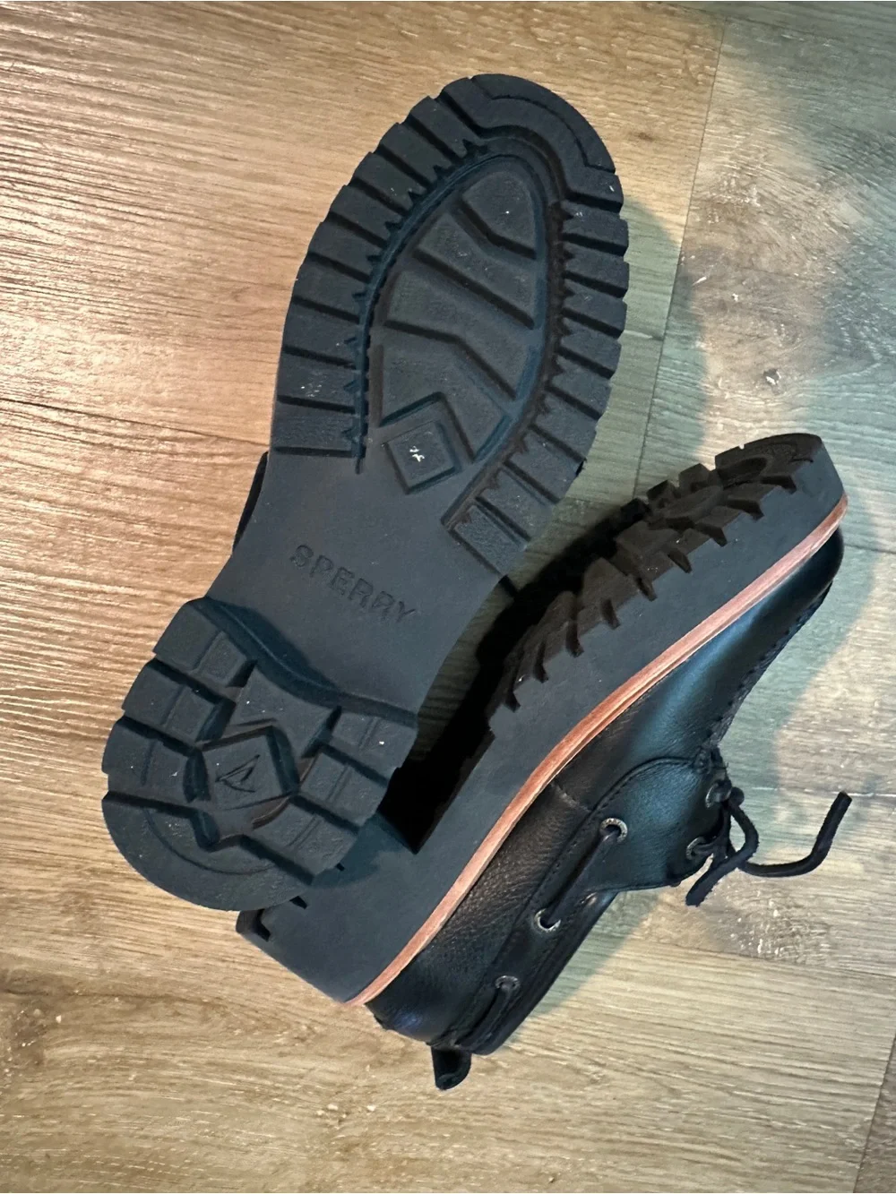 Women’s Black Leather Lug Sole Boat Shoes